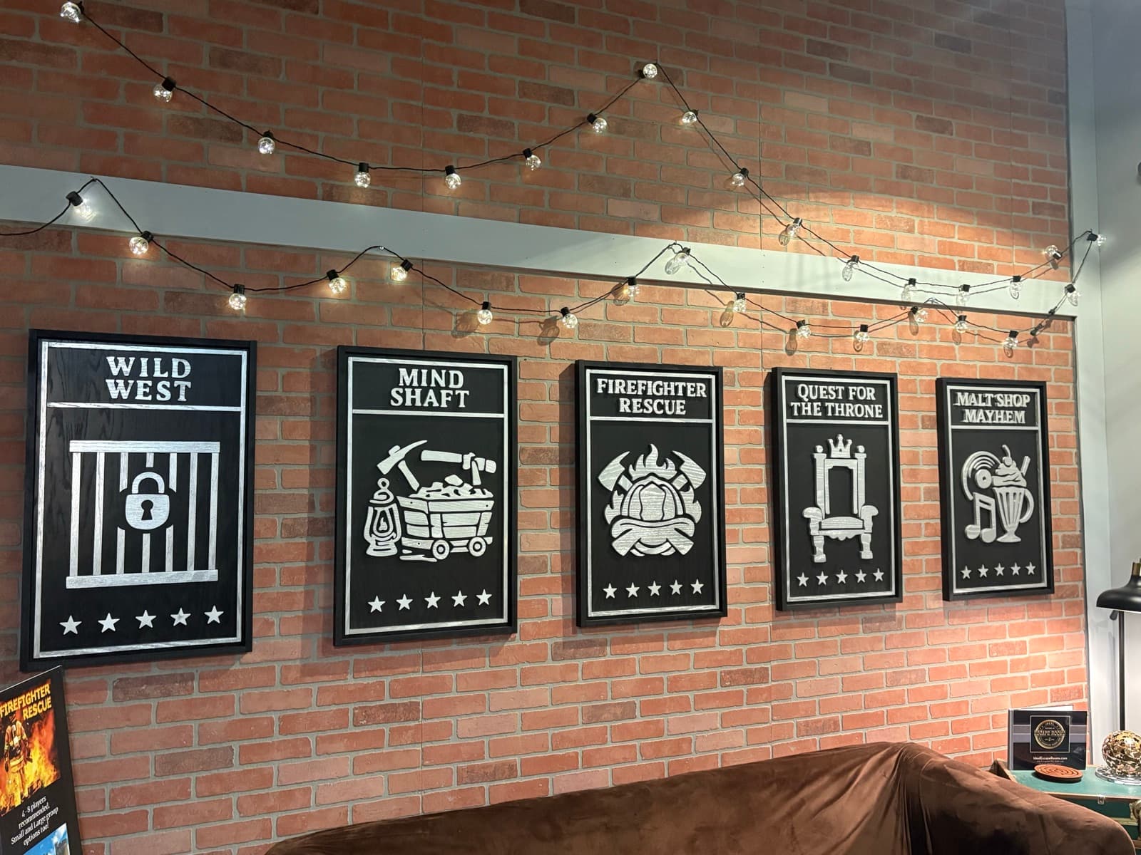 The five escape room themes at Ideal Escape Rooms: Wild West, Mind Shaft, Firefighter Rescue, Quest for the Throne, and Malt Shop Mayhem